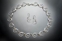 Sterling Silver Jewelry Set, Handmade, Silver and Gold necklace Set, Birthday Present, 18 Inches. any length available, prices vary depending on the length. Elegant Spiral Sterling Silver Necklaces, Elegant Sterling Silver Spiral Necklace, Elegant Silver Spiral Necklace, Elegant Swirl Necklace For Gift, Elegant Swirl Necklace For Gifts, Elegant Sterling Silver Swirl Necklace, Elegant Spiral Necklaces For Jewelry Making, Elegant Gold Swirl Necklace, Silver And Gold Necklace