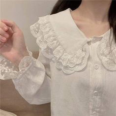 Kawaii Lolita long sleeve Shirt with double lace decoration on collar ONE SIZE Bust: 92cm Length: 58cm Material: COTTON, Polyester Casual White Blouse With Boho Collar, Cute White Blouse With Lace Collar, Casual Long Sleeve Tops With Lace Cuffs, White Long Sleeve Tops With Lace Sleeves, White Long Sleeve Tops With Lace Collar, White Tops With Lace Cuffs And Ruffled Collar, Kawaii Long Sleeve Tops For Spring, Cute White Blouse With Doll Collar, Cute Cotton Blouse With Lace Collar