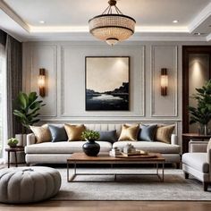 a living room with couches, chairs and paintings on the wall in it's center