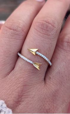 Diamond Arrow Ring, Arrow Stackable Ring, Pave Diamond Arrow Band, Arrow Wrap Ring, 14k Solid Gold Ring, Trendy Fine Jewelry, Handmade Genuine Wrap Ring, Open End Engagement Ring Women,  ** SPECIFICATIONS ** ------------------------------- Metal:  10K -14K -18K Solid Gold 925 Sterling Silver, * Stone Details * Shape: Round Cut Stone: Moissanite  Color: Colorless  Clarity: VVS1 Grade: Excellent Total Carat Weight: 0.20 CTW Approx +- ❁ Free Engraving ❁ * It is a complimentary service that could be Arrow Wrap Ring, Arrow Ring, Cleaning Silver Jewelry, Wrap Ring, Jewelry Images, Round Moissanite, Stackable Ring, Wrap Rings, Trendy Jewelry