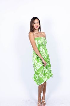 Being a staple piece in any wardrobe, the Tube Dress provides simplicity and elegance all in one! Dress up or down this free flowing floral dress for that perfect beach day & date night. Featuring adjustable self-tie straps, along with a smocked bodice that hugs your curves & two different length options, the Tube Dress is always a fan favorite. Be sure to look at our Matching Collection for all of your matching family prints needs in tropical Hawaiian designs! A flowing design of beautiful monstera leaves & floral blooms fill the canvas for our Monstera Abstract print. This simplistic yet stunning print is offered in 2 different colorways: black & green. * 100% Rayon * One size fits most (S-2XL) * Knee length and ankle length available. * Adjustable self-tie straps for standard shoulder t Casual Green Dress For Beach Cover-up, Green Tropical Print Floral Dress For Summer, Beachy Sleeveless Ruffled Dress, Beach Season Green Ruffled Dresses, Green Ruffled Midi Dress For Vacation, Summer Strapless Dress For Beach Cover-up, Strapless Sundress With Floral Print For Beach, Strapless Floral Print Sundress For The Beach, Strapless Summer Dress For Beach Cover-up