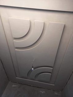 an open door in the ceiling of a bathroom