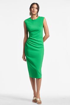 The Diana Dress is a timeless, effortless and chic piece sure to enhance any wardrobe with a pop of kelly green. Crafted with comfort in mind in a thick stretch crepe, her elegant design offers effortless transitions from work to evening events and even weddings. Make dressing up easy - and look beautiful doing it.Details:Model is 5'10" wearing size 242" LongSide ZipperThick Stretch Crepe 92% Polyester - 8% Polyurethane ImportedStyle #R231D11-325 Elegant Green Evening Midi Dress, Elegant Green Midi Evening Dress, Formal Structured Crepe Dress, Classic Green Midi Dress For Evening, Classic Green Evening Midi Dress, Elegant Kelly Green Dress, Elegant Kelly Green Fitted Dresses, Elegant Fitted Kelly Green Dress, Green Sheath Midi Dress For Cocktail