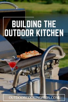 an outdoor grill with pizza on it and the words building the outdoor kitchen