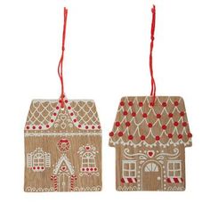 two wooden ornaments hanging from strings on a white background