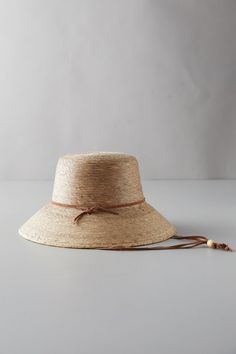 Hand-woven from sustainable palm fibers, this hat is equally suited for a day of work in the garden, or an afternoon at the beach. A soft, flexible interior band ensures a snug and comfortable fit. Beauty Redefined, Anthropologie Holiday, Womens Straw Hats, Raffia Hat, Bhldn Weddings, Beach Inspired, Wide Brimmed Hats, Summer Hats, Party Hats