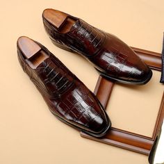 Introducing our Vintage CrocLuxe Oxford Dress Shoes, the epitome of timeless elegance and sophistication. Crafted with the finest quality genuine leather, these shoes are designed to make a lasting impression. The upper material is made from cow leather, ensuring durability and a luxurious feel, while the intricate brogue detailing adds a touch of sophistication and style. Elevate your style and make a statement with our Vintage CrocLuxe Oxford Dress Shoes. Elegant Wingtip Lace-up Shoes With Red Sole, Elegant Lace-up Shoes With Red Sole, Classic Loafers With Red Sole For Business, Classic Business Loafers With Red Sole, Italian Cap Toe Oxfords For Office, Timeless Brown Pointed Toe Leather Shoes, Timeless Brown Leather Shoes With Pointed Toe, Timeless Brown Leather Pointed Toe Shoes, Classic Wingtip Dress Shoes With Red Sole