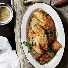 Tilapia with Lemon-Garlic Sauce | CookingLight.com #myplate #protein Fish Entrees, Lemon Garlic Sauce, Garlic Sauce Recipe, Cooking Light Magazine, Cooking Light Recipes, Tilapia Recipes, Healthy Menu, Cooking Light, Lemon Recipes