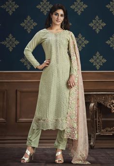 Pista green chinon pakistani suit ACU9253  Desc:  Style : Pant Style Suits Color : Pista Green Fabric : Chinon Work : Embroidery   Sequence Wash Care : Dry clean Sleeve Style : Full Sleeve Long Sleeves : Done only in Custom Stitch Sleeves Lining : Done only in Custom Stitch Bust Size : 32 to 42 Inches Occasion : Temple Wear   Social Gathering   Lohri   Raksha Bandhan   Vaisakhi. With Express Free Shipping and Custom Stitching, Buy Indian Party wedding wear bridal Anarkali Salwar Pista green chin Pakistani Suit With Pants, Latest Pakistani Suits, Bridal Anarkali, Pista Green, Pakistani Suit, Pakistani Salwar Kameez, Embroidery Top, Pakistani Suits, Pant Suit