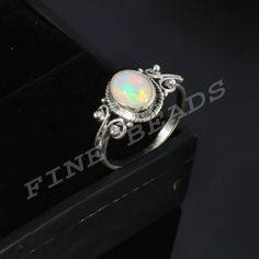 100% Natural Ethiopian Opal Ring ------------------------------------------------------- ♥ Stone  :  Ethiopian Opal ♥ Shape  :  Oval ♥ Weight  : 11.1 ♥ Size   : 9-7 mm  ♥ Cut Grade  :  Excellent ♥ Metal  : 925 Sterling Silver  ♥ Metal Purity : 925 per 1000 stamped ♥ Transparency  :  Opaque ♥ Modified Item  :  No ♥ Country of Origin  :  Ethiopia ♥ Natural/Lab-Created  :  Natural ♥ Country/Region of Manufacture  :  India ♥About gemstones-Opal is birthstone for October. It is linked to the element Boho Opal Ring, Natural Opal Ring, Fire Ring, Ethiopian Opal Ring, Ring Stone, Ring Boho, Opal Ring, Healing Powers, Natural Opal