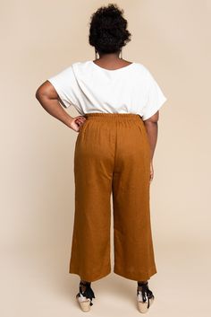 Part of our Rome Collection, the Pietra Pants & Shorts are the best of both worlds; a flat front, high-waisted silhouette with the comfort of an elastic waist in the back. Featuring lengthening panels in the front with slanted hip pockets and a hidden waist stay, you'll never want to take them off. Choose between four leg styles: a wide leg in floor-skimming or cropped length (View A), a slim and tapered leg (View B), or gently flared shorts (View C). Skill Level: 2 of 5 Sizes: 0 to 20 New, Pietra Pants, Flared Shorts, Closet Core Patterns, Trouser Pattern, Sewing Courses, Garment Pattern, Paper Sewing Patterns, Best Of Both Worlds, Sewing Blogs