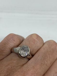 Vintage Engagement Ring clear CZ 925 Sterling Silver cocktail Sizes 6, 7, 8 Can be resized, my jeweler charges $10-$20 All rings are shipped free in the US in a nice gift box. Check out our over a THOUSAND great reviews Engraving is $4 per letter and is not always perfect depending on the piece. It can take a few days if the jeweler is busy. This is payable to Paypal Judithsltd@gmail.com Modern Oval Jewelry With Vs Clarity, Modern Vs Clarity Diamond Ring Gift, Modern Diamond Ring With Vs Clarity As Gift, Classic Silver Ring With White Topaz, Formal Silver Channel Set Jewelry, Classic Clear Cubic Zirconia Jewelry, Oval Diamond Ring With Vvs Clarity, Formal Silver Jewelry With Channel Set, Classic Silver Oval Diamond Ring