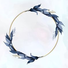 a circular frame with blue leaves and flowers