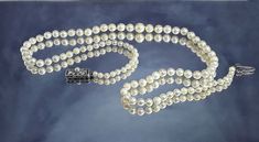 This is a gorgeous, lustrous, delicate, classic necklace which was a part of the sold estate. It was certified and valued by the local Mikimoto dealers. The pearls will come to you with this certificate.  This Mikimoto pearl necklace consists of a single graduated strand of 89 luminous Akoya (or similar) pearls of round shape. Each pearl is meticulously calibrated from 6.9mm largest at the front, working its way down to 3.2mm near the clasp. The colour of the pearls is a wonderful subtle creamy Timeless Silver Pearl Necklace For Wedding, Classic Silver Pearl Necklace With 17 Jewels, Classic Pearl Necklace With Jewels For Anniversary, Antique Round Pearl Necklace For Wedding, Classic Pearl Necklace With 17 Jewels For Wedding, Classic High Luster Necklaces For Anniversary, Refined Round Pearl Necklace For Wedding, Classic Round Bead Necklaces For Weddings, Classic Wedding Necklaces With Round Beads