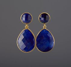 This pair of two tier genuine gemstone (sapphire) earrings would be a nice reward for your self or a great gift for your mother or best friend. Each one has two tiers of natural stones:1. top tier: a small (11mm) round sapphire in gold bezel2. bottom tier: a large pear shaped sapphire (natural gemstone) stone (about 25 x 19 mm) set in gold bezel    Note: other stone combinations available. Please inquire.3. earring total length ~ 40 mm4. bezel material: 24k gold plated5. earring wire: 24k gold p Sapphire Earrings Drop, Sapphire Earring, Amazonite Earrings, Shiny Rings, Earring Wire, September Birthday, Sterling Silver Locket, Round Sapphire, Jade Earrings