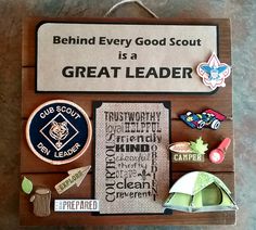 there is a sign that says behind every good scout is a great leader