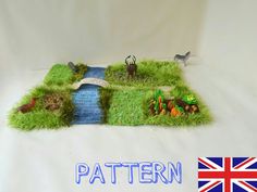 an image of a grass land with animals and plants on it that is made to look like a map