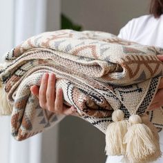 PRICES MAY VARY. 【UNIQUE DESIGN】This bohemian throw blanket provides a beautifully modern tribal pattern on both the front and back. The ends of the blanket are finished with soft tassels, giving this accessory an extra touch of texture and style. 【MATERIAL & SIZE】Made of acrylic fiber, which is warm and cozy to touch. The decorative woven throw blanket is suitable for all seasons and takeout to keep warm, measures 50x70 inches, and weighs 28.9 oz (820 grams). 【HIGH QUALITY】The farmhouse throw b Boho Fur Bedding, Boho Tassel Bedding, Throw Blanket Pottery Barn, Amber Interiors Throw Blanket, Tan Blanket Bed, Fall Bedding Farmhouse, White Bedding Brown Blanket, Modern Western Boho Bedding, Beautiful Homemade Neautral Blanket