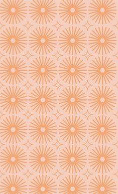 an orange and white pattern with sunbursts in the center on a light pink background