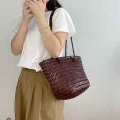 Leather Bucket Shoulder Bag With Woven Detail, Daily Use Bucket Bag With Intrecciato Weave, Summer Rectangular Bucket Bag With Intrecciato Weave, Casual Brown Bucket Bag With Braided Handles, Casual Brown Woven Bucket Bag, Casual Woven Leather Bucket Bag For Shopping, Summer Bucket Bag With Intrecciato Weave, Everyday Use Bucket Bag In Woven Leather, Everyday Woven Leather Bucket Bag