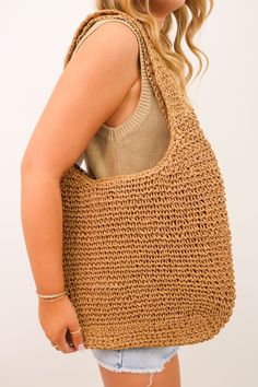 Effortlessly elevate your summer style with our Crochet Rattan Straw Hobo Bag! Handwoven from natural straw, this tote is easy to carry and perfect for your next getaway. Travel in style with our beautiful bag! Crochet rattan straw hobo bag Zippered closure Lined Casual Everyday Bags Made Of Natural Fiber, Casual Natural Woven Bags, Natural Crochet Bag For Vacation, Lightweight Bohemian Brown Straw Bag, Bohemian Lightweight Brown Straw Bag, Lightweight Brown Bohemian Straw Bag, Bohemian Lightweight Beach Bag In Natural Color, Bohemian Lightweight Natural Beach Bag, Lightweight Natural Shoulder Bag For Vacation