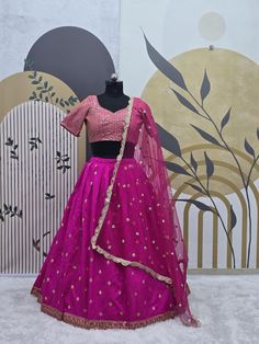 Fabric : 👉 Taffeta silk lehenga with sequence & zari work  ( 3 meter flair ) 👉 Taffeta silk blouse with sequence work all over front & back ( Unstitch ) 👉 Net Dupatta with sequence work & border work CARE INTRODUCTION:- HAND WASH \ ONLY DRY AND CLEAN What is meaning of semi stitched Product :- Semi stitch lehenga means that the pattern of the lehenga is ready and only the fitting of the lehenga as per your waist and height(waist to floor) has to be done. The blouse(Choli) of lehenga is UN-sti Semi-stitched Art Silk Lehenga With Self Design, Silk Lehenga With Zari Work For Party, Semi-stitched Silk Party Wear Choli, Silk Lehenga With Resham Embroidery For Party Wear, Silk Party Wear Choli For Diwali, Party Wear Silk Choli For Festive Occasions, Satin Set With Zari Work For Eid, Diwali Gown With Dori Work In Dola Silk, Party Satin Dupatta With Cutdana