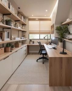 an office with shelves, desk and computer