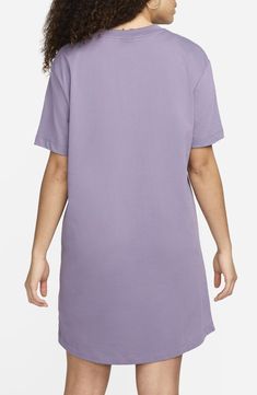 Take your athleisure game to the next level with a soft cotton jersey dress that feels like your favorite Nike T-shirt in a comfortably oversized fit. 34 1/2" length (size Medium) Crewneck Short sleeves Unlined 100% cotton Machine wash, tumble dry Imported Oversized Casual T-shirt For Daywear, Casual Solid Color T-shirt Dress For Loungewear, Casual Cotton T-shirt Dress With Relaxed Fit, Relaxed Fit Cotton T-shirt For Day, Cotton Relaxed Fit T-shirt For Daywear, Cotton T-shirt Dress With Graphic Print, Relaxed Fit, Oversized Cotton T-shirt Dress With Graphic Print, Oversized Cotton Sleep Top, Crew Neck T-shirt For Daywear