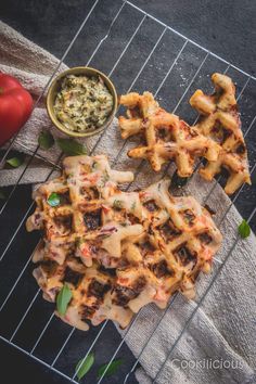 some food is sitting on a cooling rack