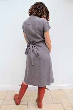 Our love of linen continues with this lovely linen wrap dress. Made in light weight Grey linen fabric, which has been prewashed giving a soft feel. With its flattering sleeves and the all essential Voy side pocket. This will quickly become one of your go-to dresses, and will find it really useful both for work and play! A capsule wardrobe must for the coming season! Length is below knee to mid-calf. Handmade in our studio to order Easy care as you can hand/machine wash. Linen used is Oeko Tex ce Linen Wrap Dress, Gray Linen, Dresses Uk, Side Pocket, Find It, Our Love, Mid Calf, Capsule Wardrobe, Linen Fabric