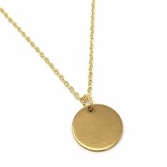 "* One Minimalist Gold Colored Necklace (Includes Charm and Chain) * Part of Our Posh Babe Jewelry Collection of Minimalist Pieces * Necklace Chain Length Chosen from Drop Down Menu at Checkout (16\", 18\", 20\", 22\" Length Options) * Circle Disc Charm is made of Gold-Plated Stainless Steel. The Circle Disc Charm measures approx. 1/2-inch. * This piece is great as a minimalist necklace on its own or can be layered with any of our other necklace options! * Processing and Shipping: We pride ourse Simple Gold Round Necklace, Gold Necklace With Simple Round Design, Simple Gold Necklace With Round Pendant, Simple Gold Necklace With Round Shape, Everyday Brass Necklace, Everyday Gold Cadmium-free Charm Necklace, Everyday Circular Brass Necklace, Simple Round Everyday Necklace, Simple Everyday Round Necklace