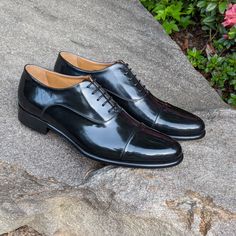 A modern take on a classic design. The cap toe oxford is the quintessential business shoe. However with the hidden stitching and folded seams we have created a sleeker, more elegantly flowing shoe. Add in one of the hand dyed patinas and you have a business shoe that is anything but boring. Hand painted full grain Italian leather Recraftable Blake stitch construction Available in any color including unfinished crust leather for a truly custom patina. Timeless Plain Toe Oxford For Formal Occasions, Timeless Plain Toe Oxford For Derby, Timeless Plain Toe Oxford Shoes For Derby, Classic Fitted Oxford Lace-up Shoes, Timeless Almond Toe Oxfords For Business Casual, Fitted Oxfords With Round Toe For Semi-formal Occasions, Timeless Plain Toe Oxfords For Semi-formal Occasions, Timeless Plain Toe Goodyear Welted Oxfords, Timeless Goodyear Welted Oxfords For Business Casual