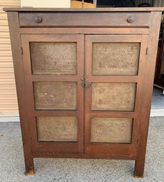 Primitive original North Carolina piesafe c1870 dark stain 12 punched out star tins three fixed shelves dovetail top drawer two board top old square nails mixed wood 41.5W18D52.5H shipping is not free, please read my store policy section before placing an order F09 Chimney Cabinet, Antique Pie Safe, Tin Panel, Antique Cupboard, Punched Tin, Pie Safe, Dark Stain, Primitive Furniture, Handmade Wardrobe