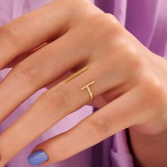 Introducing our Plain Cuff Ring, a minimalist masterpiece. Crafted in your choice of 14k solid gold, this unique open T-bar ring features an adjustable double bar design. Its simplicity and asymmetry make it an elegant choice for women who appreciate contemporary jewelry.  The Ring Details * 14k Solid Gold (also in 10k,18k) * Band Options; Yellow Gold, White Gold Rose Gold * Band Width: 1.55 mm. * Top Width: 14.79x5.90 mm. * Thickness: 1.10 mm * Ready to Ship 7 Business Days 🦄 Find out more abo Minimalist Jewelry With Open Band Ring Detail, Modern Initial Ring With Simple Open Design, Modern Initial Ring With Open Design, Modern Open Initial Ring With Simple Design, Modern Initial Open Ring With Simple Design, Modern 14k Gold Midi Rings, Modern Initial Ring With Simple Design, Modern 14k Gold Open Midi Rings, Minimalist Open Initial Ring