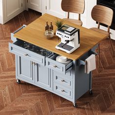 a small kitchen island with an appliance on top