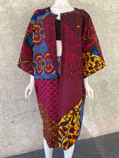 Beautiful African Print Kimono/Duster in a beautiful African Wax fabric 100% Cotton One size Length: 44 inches No pockets Please note that this is a handmade item. Fabric placement may vary. Colors remain the same African Print Kimono, African Chic, Kimono Duster, Wax Fabric, Print Kimonos, Dress Clothes For Women, African Print, Art Collection, Dress Outfits