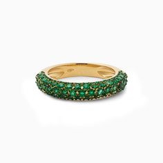 Adorned with a dazzling array of green emeralds, this contemporary and voluminous ring brings a generous amount of shimmer to your attire. Discover the perfect blend of luxury and charm with our bubble ring collection. Stack it alongside any of our additional bubble rings, offered in a spectrum of seven vibrant color choices. Material: 18kt Gold & Natural Emeralds Carats: 1 cts Color: Available in 18kt Yellow Gold Length: n/a Size: All ring sizes available Closure: n/a Luxury Green Half Eternity Ring, Fine Jewelry Green Emerald Half Eternity Ring, Green Emerald Half Eternity Ring Fine Jewelry, Green Emerald Ring With Half Eternity Style, Green Emerald Diamond Ring With Pave Setting, Green Emerald Ring With Round Diamond Band, Green Emerald Ring With Pave Setting, Green Emerald Ring With Pave Setting For May Birthstone, May Birthstone Emerald Ring With Pave Setting