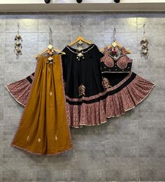 Black Chaniya Choli for Navratri Patola Lehenga 3 pc Readymade garba Lehenga Festival outfit Gamthi Work Garba Night lehenga ready to wear 🌷Lehenga Choli🌷 You get to decide how your Navratri goes. we made that assist decision for you an array of patola Real Hand Work design with gamthi work to make your garba look blend of tradition❣ Top Pattern : Embroidered(Real Hand Work) Lehenga Pattern : Embroidered(Real Hand Work) Lehenga(Stitched) Lehenga Fabric : Rayon Cotton Lehenga Work : Patola Real Hand Work With Gamthi Work Lace Border Pure mal cotton duptta  with foil mirror work  Lehenga Closer : Drawstring With Dori Stitching : Stitched With Canvas and Full Inner Length: 42 Flair : 7 Meter Inner : Micro Cotton Blouse (Stitched) Blouse Fabric : Rayon Cotton (Fully Stitched) Blouse Work : P Designer Anarkali Choli For Navratri, Anarkali Choli For Navratri Designer Wear, Cotton Semi-stitched Lehenga With Gota Work, Cotton Lehenga With Gota Work, Semi-stitched, Cotton Lehenga With Gota Work For Wedding, Traditional Cotton Lehenga With Gota Work, Designer Cotton Lehenga With Gota Work, Semi-stitched Skirt Set With Pallu For Navratri, Anarkali Style Cotton Choli With Gota Work