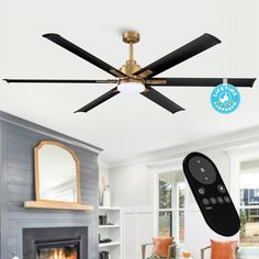 a ceiling fan with remote control in a living room setting, and the light is on