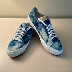 Nwot! Superga Denim Multi Tie-Dye Sneakers, Size 9 Walk Around Town In Style With The Superga 2750 Denim Multi Tie-Dye Sneakers! These Super Chic Canvas Sneakers Have An Allover Blue And White Tie-Dye Pattern That Mimics Your Favorite Distressed Jeans! Lace-Up Front, Silver Hardware, Logos At The Outstep And Heel, And 1.5" White Bumper Sole. Man-Made Materials. Imported. Lightly Cushioned Insole. Rubber Sole Has Nonskid Markings. All Of My Listings Come From Pet Free, Smoke Free Home. Blue Casual Sneakers With Speckled Midsole, Casual Blue Sneakers With Speckled Midsole, Denim Blue Cotton Lace-up Sneakers, Blue Denim Sneakers With Rubber Sole, Casual Denim Slip-on Sneakers, Blue Cotton Sneakers With Gum Sole, Blue Denim Sneakers With Vulcanized Sole, Sporty Denim Sneakers With Rubber Sole, Blue Denim Lace-up Sneakers