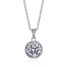 Our Love Nest Moissanite Pendant Necklace is designed with a delicate 14K white gold setting that secures a genuine Moissanite gemstone. This pendant necklace is a timeless addition to any jewelry collection, as its brilliant cut offers undeniable sparkle and shine. Moissanite is a naturally occurring gemstone that is durable and long-lasting, making it an excellent choice for those who want a necklace that will last for many years. Product Details: Material: 925 Sterling Silver Stone: Moissanit Exquisite Silver Round Cut Diamond Necklace, Silver Necklace With Vvs Clarity, Moissanite Necklace With Brilliant Cut Round Pendant, Classic Moissanite Round Pendant Necklace, Silver Necklace With Diamond Cut, Dazzling Silver Necklace With Prong Setting, Timeless Moissanite Round Pendant Necklace, Exquisite White Gold Solitaire Necklace With Cubic Zirconia, Silver Necklace With Diamond Cut Round Shape