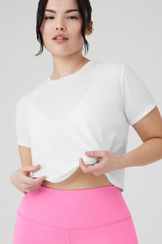 The Cropped All Day Short Sleeve is the ultimate everyday, throw-on-and-go crew neck tee. It’s made from super-soft, lightweight modal jersey fabric and hits right at the waist — perfect for creating effortless and endless outfits with any Alo bottom. Wear it solo or layered under a light cover up and get going. Super-soft modal jersey fabric Pairs perfectly with go-to high-waist bottoms Designed & uniquely fit to flatter every size Wear-tested by our in-house team for the perfect fit White Stretch Alo Yoga Top, Alo Yoga White Stretch Top, Alo Yoga Fitted Cropped Tops, Fitted Alo Yoga Activewear With Built-in Shorts, Alo Yoga Compressive Activewear With Built-in Shorts, High Waist Bottoms, Light Cover, Alo Yoga, Back Women