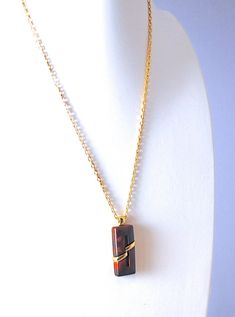 "This is such a fabulous vintage pendant. Elite was an American high quality craftsmanship costume jewelry designer and distributor back in the late 1960s. It is signed Elite and hangs from an 18\" vintage chain. 16\" and 20\" vintage chains also available. Please convo if you would like a different size chain. They are in very good vintage condition, never before worn! Measures 2\" long and 3/4\" wide." Retro Brown Necklace For Gift, Retro Brown Jewelry For Gift, Vintage Formal Necklace With Rectangular Pendant, Vintage Necklaces With Rectangular Pendant For Anniversary, Vintage Necklace With Rectangular Pendant For Anniversary, Retro Pendant Necklace For Formal Occasions, Vintage Chain, Late 1960s, Vintage Pendant