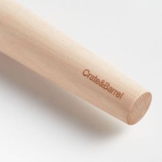 a close up of a wooden baseball bat on a white surface with the word ottabaari written on it