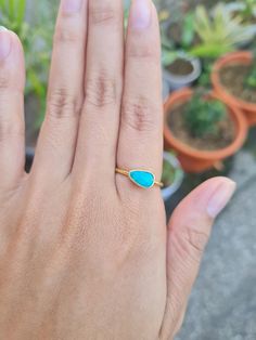 925 sterling silver 18k gold plated ring set with an opal gemstone.  Code  R_547_TS Weight approx  1.7 g Adjustable Teardrop Yellow Gold Ring, Opal Band, Small Ring, Mabe Pearl, Small Rings, Gold Plated Rings, Amethyst Crystal, Opal Gemstone, Crystal Pendant