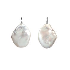 The Sienna Earrings, crafted from exquisite baroque pearls, are available in both silver and gold finishes. Featuring a unique flat shape and vintage style, these earrings offer timeless elegance. Each pair of pearls is uniquely shaped, and we will carefully select the best match for you. Elegant Earrings With Baroque Pearl Charm, Elegant Baroque Pearl Earrings With Pendant, Elegant Baroque Pearl Earrings In Pear Shape, Formal Drop Earrings With Baroque Pearls, Wedding Earrings With High Luster Baroque Pearls, Elegant Baroque Pearl Pendant Earrings, Elegant Baroque Pearl Drop Earrings, Wedding Baroque Pearl Earrings With High Luster, Luxury Silver Baroque Earrings