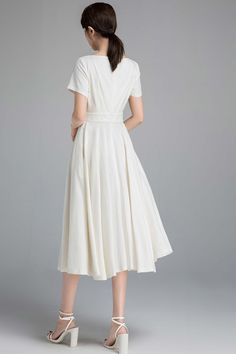 "The linen dress is the epitome of feminine chic and is sure to turn heads. Casual outfit dress. DETAILS * Linen blend * 50% linen , 50% cotton blend * Cotton lined on the upper * Fitted waist to show off your curves * Concealed Back zip closure * Two side seam pockets * Boat neck casual outfit dress * Perfect for a summer, Spring * Wash by hand or machine with cold water, Ironing after dry * More color selection https://etsy.me/39Ix6x0 FABRIC SWATCH linen cotton blend 42# https://www.etsy.com/l White Mid-length Summer Midi Dress, White Mid-length Midi Dress For Summer, Off White A-line Midi Dress For Summer, White Fitted A-line V-neck Dress, Elegant Short Sleeve Summer Dress In Solid Color, Elegant Short Sleeve Solid Color Summer Dress, Elegant Short Sleeve A-line Summer Dress, White Midi V-neck Dress For Spring, White A-line Midi Dress For Summer