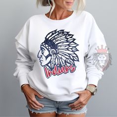 Show off in the stands with this Indians spirit wear mascot tees & sweaters. These shirts are great gifts for coaches, teachers, fans, sports players, moms, dads & the whole family! You can customize the design colors to reflect your favorite school, college, or team. To add a name (and or number) to the back of a shirt, add lounge pants, expedite processing, add overnight shipping, and any other miscellaneous items- please follow this link: https://www.etsy.com/shop/KASPDesign?ref=seller-platform-mcnav§ion_id=27547745 The listing is for one garment.  To order... 1. Select the style and size you would like, then the color for the garment.  2. Fill out the personalization section. 3. Then add to cart. To order more than one item of the same style, size, and color increase the quantity in yo Warriors Shirt Design, Pto Shirts, Spirit Wear Shirts, Gifts For Coaches, Football Spirit, Sports Players, School Spirit Shirts, Warriors Shirt, Spirit Shirts