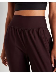 new waistband has more hold, less pinching pockets fit your phone banded cuffs go-dry wicks moisture breathable sits at belly button slim hip and thigh hits at ankle 26 1/2" regular inseam 24 1/2" petite inseam 29 1/2" tall inseam models are approx.  5'9" and wear sizes s (4), l (12) and xl (18)machine wash according to the care instruction label Comfort Stretch Yoga Pants With Contoured Waistband, Athleisure Gym Bottoms With Waistband, Yoga Bottoms With Comfort Waistband, Compressive Bottoms With Comfort Waistband, Relaxed Fit Yoga Bottoms With Elastic Waistband, Mid-rise Workout Pants With Contoured Waistband, Relaxed Fit High Waist Athleisure Bottoms, Relaxed Fit High Waist Bottoms For Athleisure, Solid Athleisure Yoga Pants With Comfort Waistband