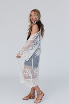 With its intricate design and comfortable fit, the Butterfly Beach Kimono is the perfect addition to any boho wardrobe! Whether you're dressing up or down, this kimono is the perfect finishing touch to any boho look because it features: See-through design crafted from delicate embroidered lace Flowy and lightweight, perfect for warm weather or layering Versatile front tie closure for a customizable fit and added style Intricate butterfly-inspired details for a charming and boho look Your favorit Bohemian Lace Beach Cover-up, Bohemian Lace Patchwork Summer Cover-up, White Lace Cover-up For Spring, Spring Festival Lace Cover-up, Lace Open Front Cover-up For Summer, White Wrap Cover-up For Spring, Bohemian Lace Cover-up For Summer, White Sheer Cover-up For Spring, Bohemian Summer Lace Patchwork Cover-up